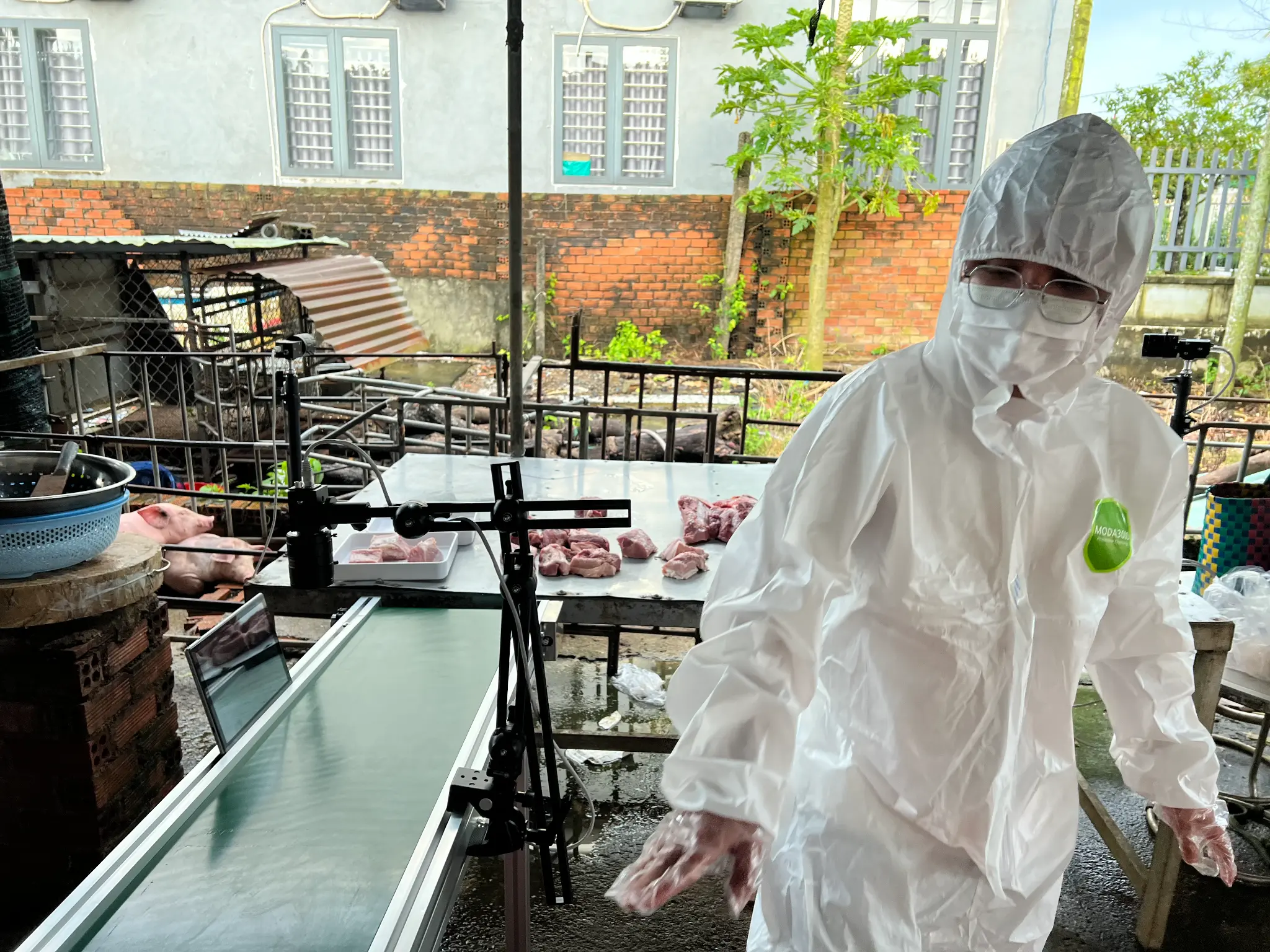 A screenshot of the Trackfarm mobile application interface showing environmental data and alerts.