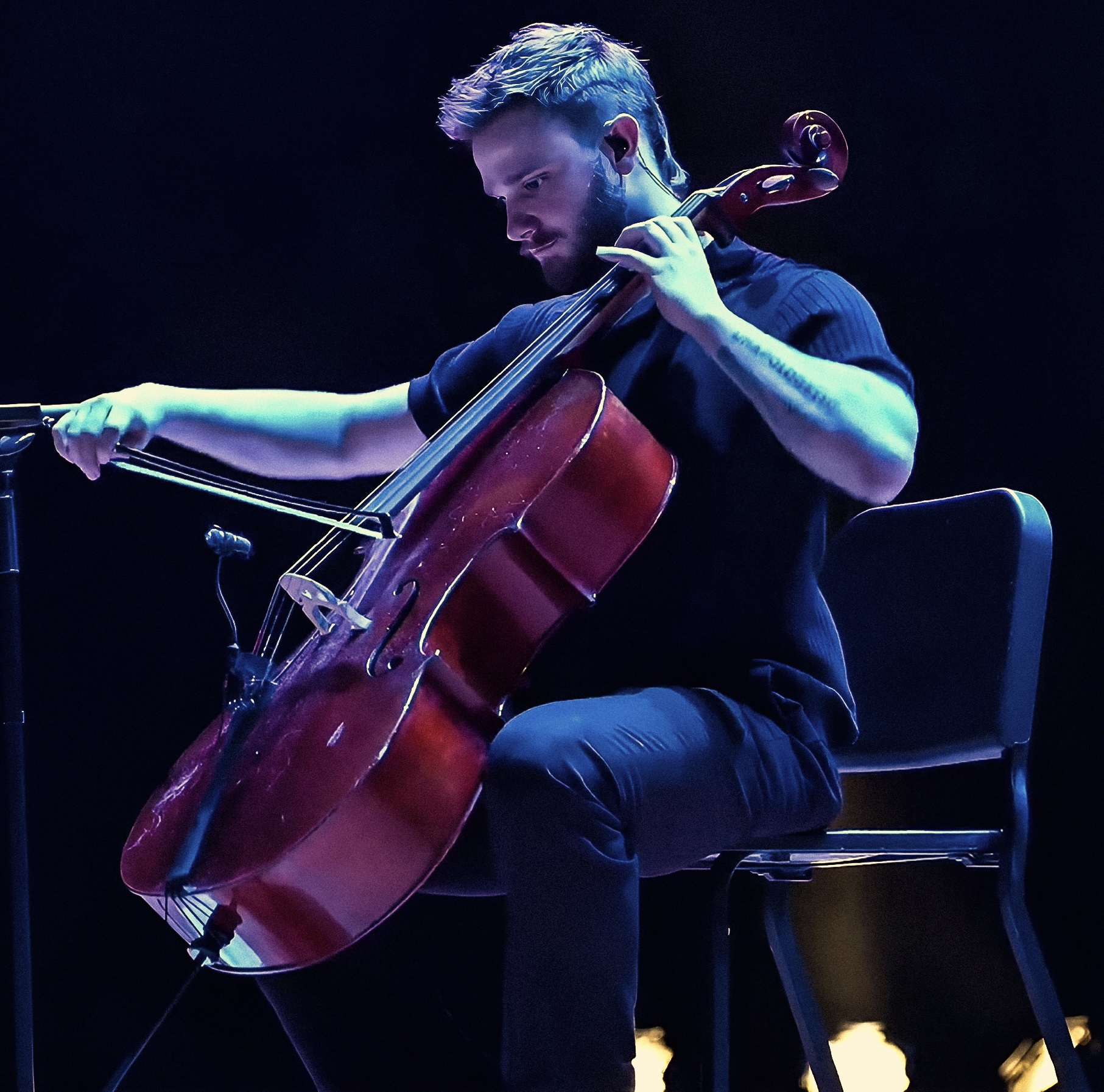 Drew Wiegman performing cello live